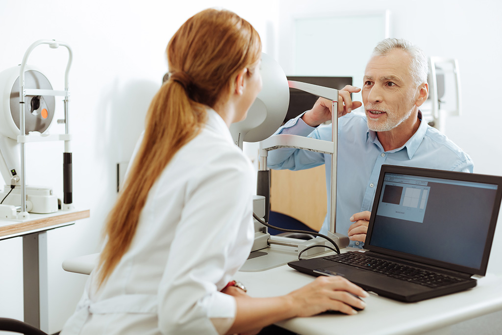 Patient speaking with the eye doctor about cataracts